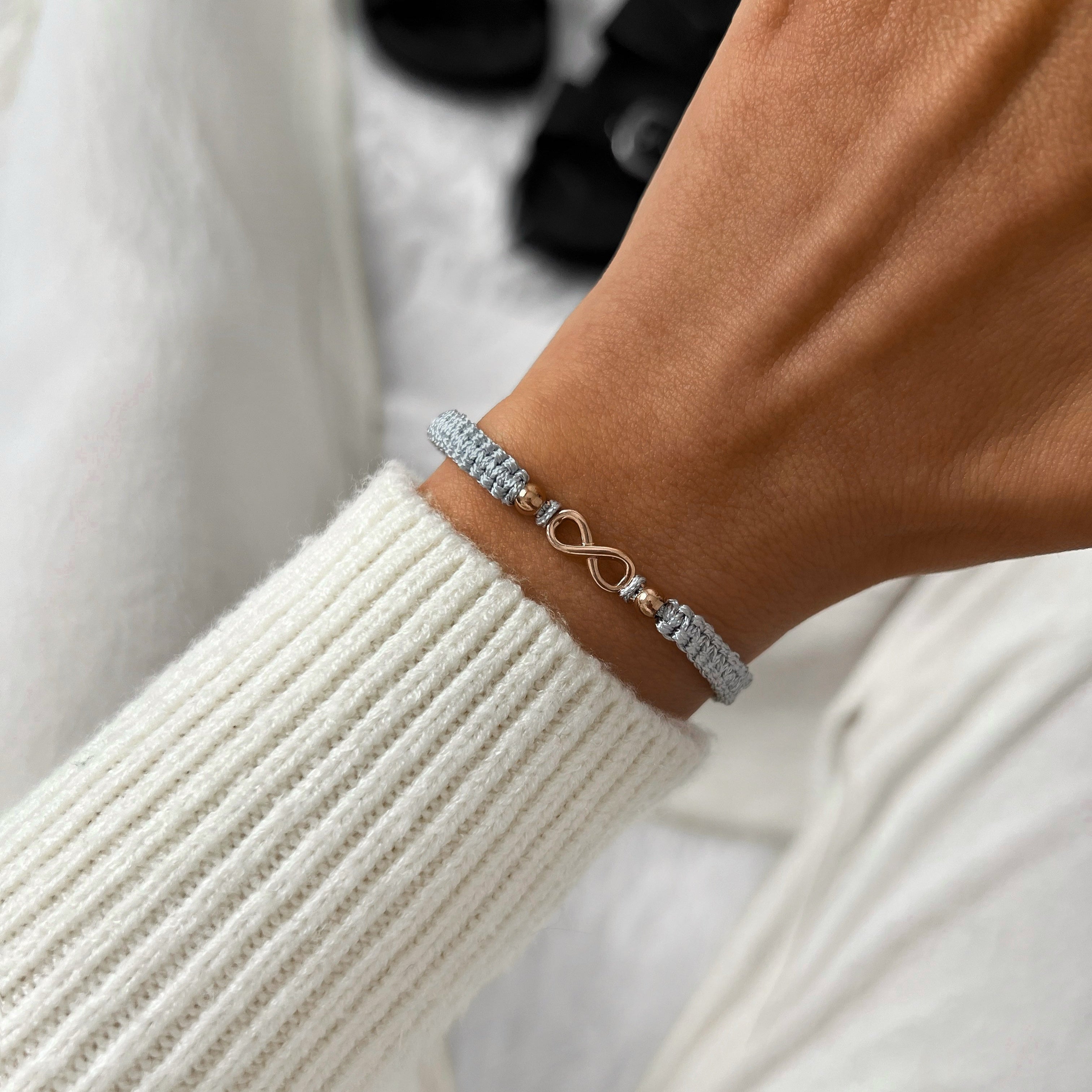 Rose Infinity Grey Braided Bracelet