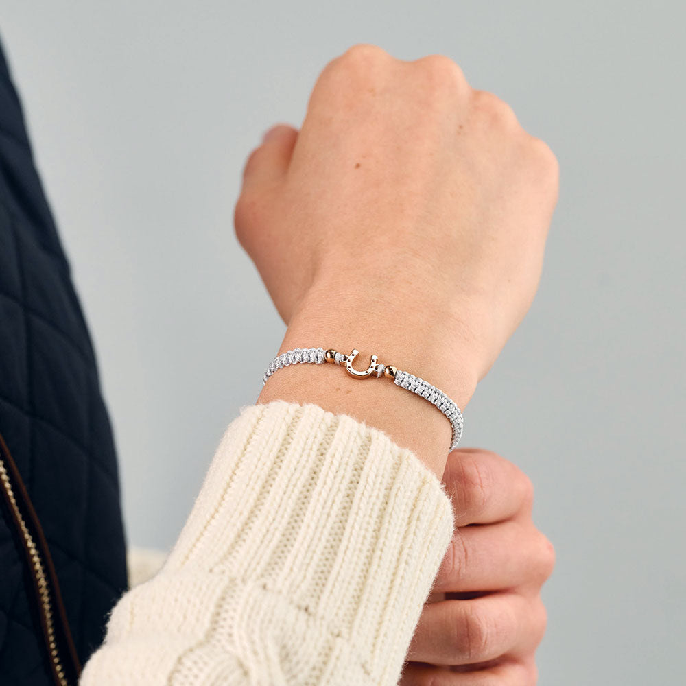 Bracelet tressé gris cavalier cheval rose