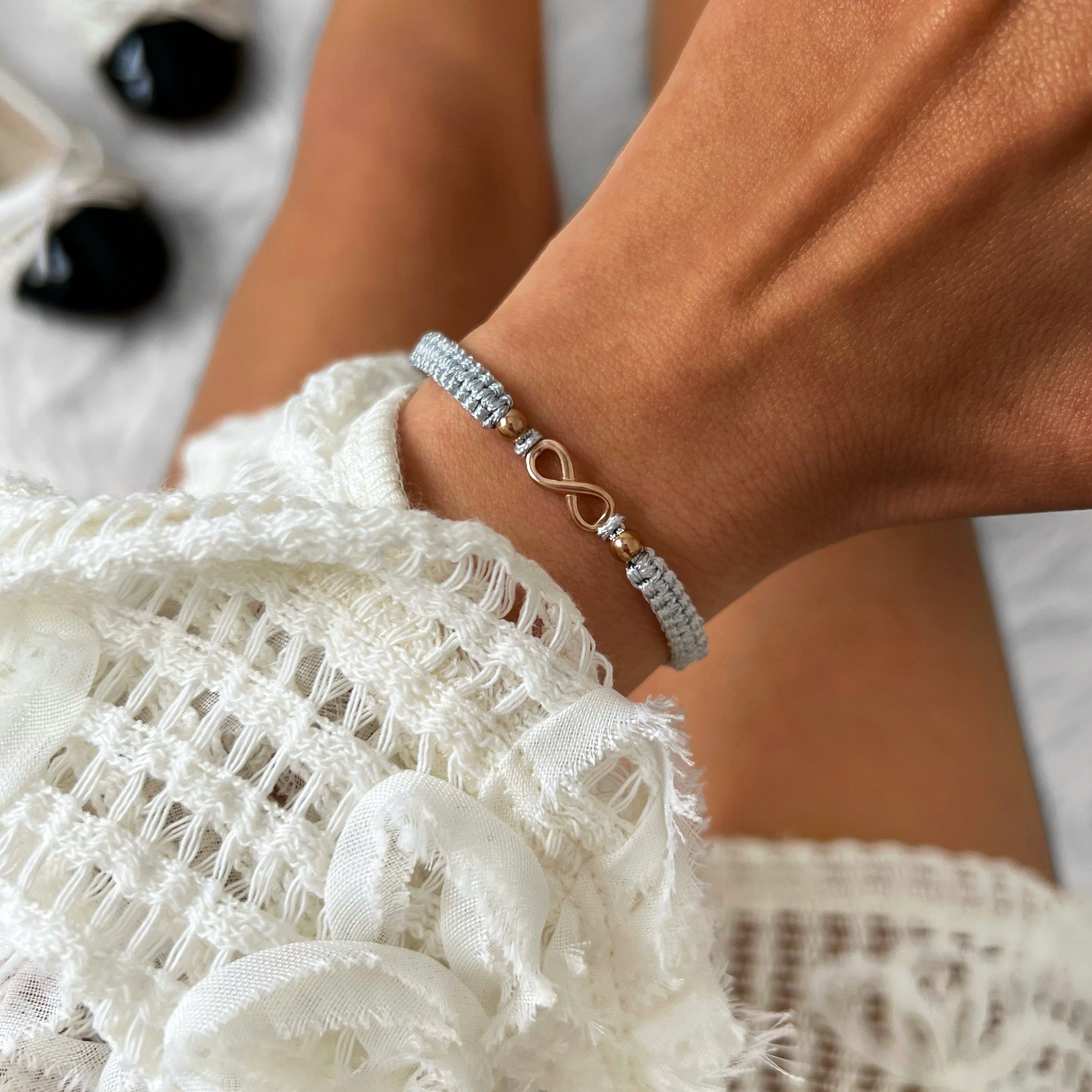 Bracelet tressé gris infini Rose